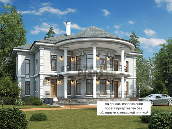 Дом из кирпича с эркером и балконом